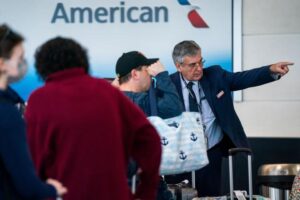 American Airlines hikes fees,Ranging From $100 To $650 tightens restrictions on frequent-flyer points